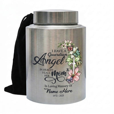 Personalized Guardian Angel Cross Flowers Stainless Steel Urn for Loss of Mother Christian Bereavement Sympathy 2 Sizes 4 Colors Memorial Keepsake Urn, Memorial Gift, In Loving Memory - Image 1 | BXGH-SMALL-SILVER-B0F9L52N47 BXGH-SMALL-BLACK-B0F9L52N47 BXGH-SMALL-RED-B0F9L52N47 BXGH-SMALL-GOLDEN-B0F9L52N47 BXGH-LARGE-SILVER-B0F9L52N47 BXGH-LARGE-BLACK-B0F9L52N47 BXGH-LARGE-RED-B0F9L52N47 BXGH-LARGE-GOLDEN-B0F9L52N47